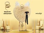 تاج گل قلبی شگل با ربان مشکی برای عزا