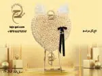 تاج گل قلبی شگل با ربان مشکی برای عزا
